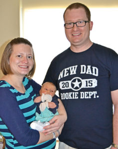 Sarah Shannon, ’04 and Justin Kindler, ’05, and daughter