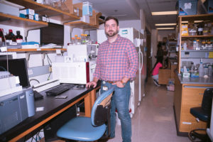 Aaron Fidler '09 in the lab he manages at Vanderbilt University where he is pursuing his doctorate.