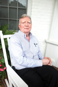 Jim Branscome sitting in a rocking chair