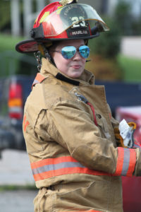 Anna Whitaker Blanken in firefighter gear
