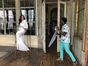 Oluwatobi Adejumo assisting with a photo shoot