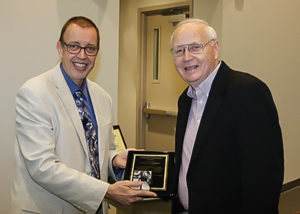 Dr. Robert Compton receiving his Distinguished Alumnus Award.