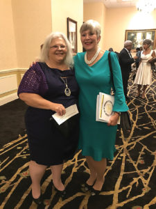 Cathy Brinkley standing next to Susan Bro. 