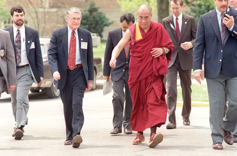 President Stephens walks through campus with Dalai Lama in 1994