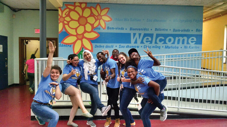 Anna Heremes with a group of interns at the Americana World Community Center