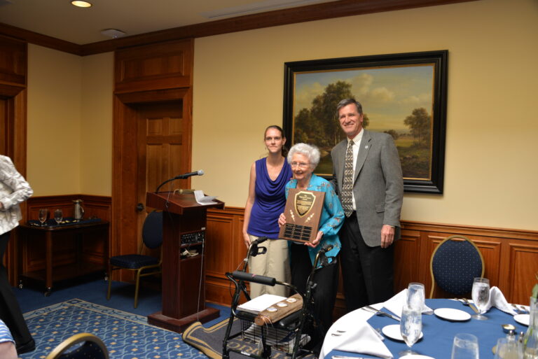 President Roelofs awards Roberta Allison for her generosity.