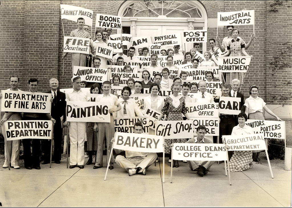 Berea College students with their representative Labor position banners, used during Labor Day festivities at the College.