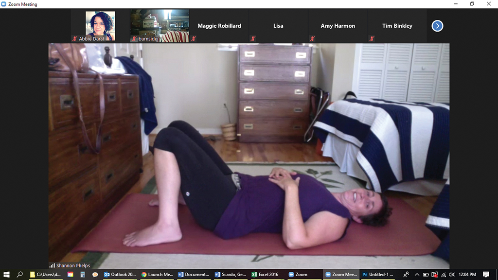 Professor Shannon Phelps performing yoga in a Zoom class