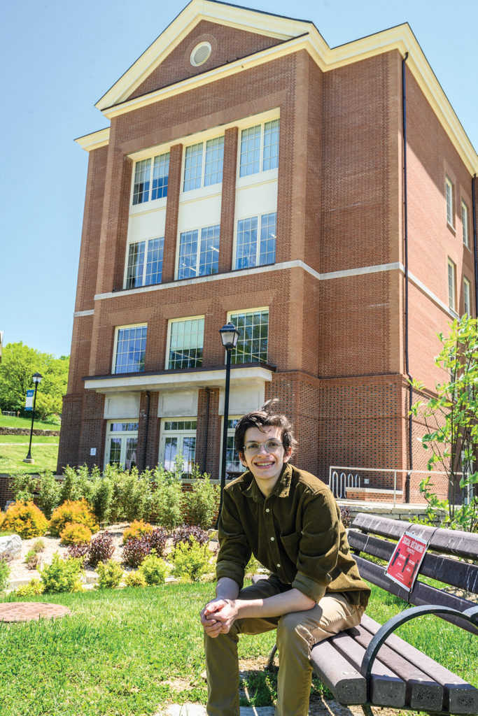 Portrait of Garett outside of the MAC building on campus