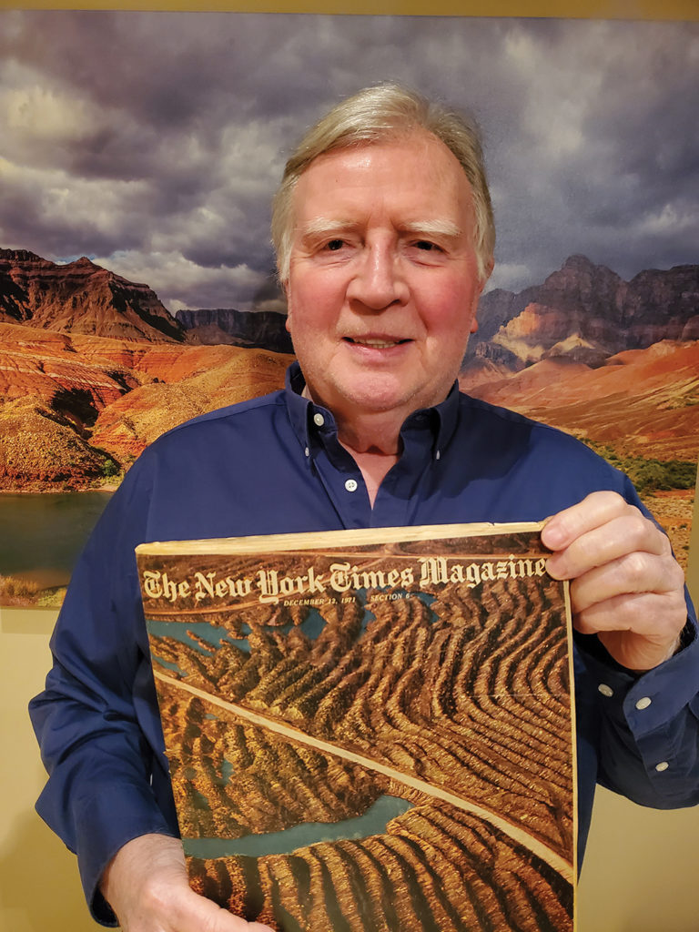 James Branscome '68 holding copy of New York Times magazine