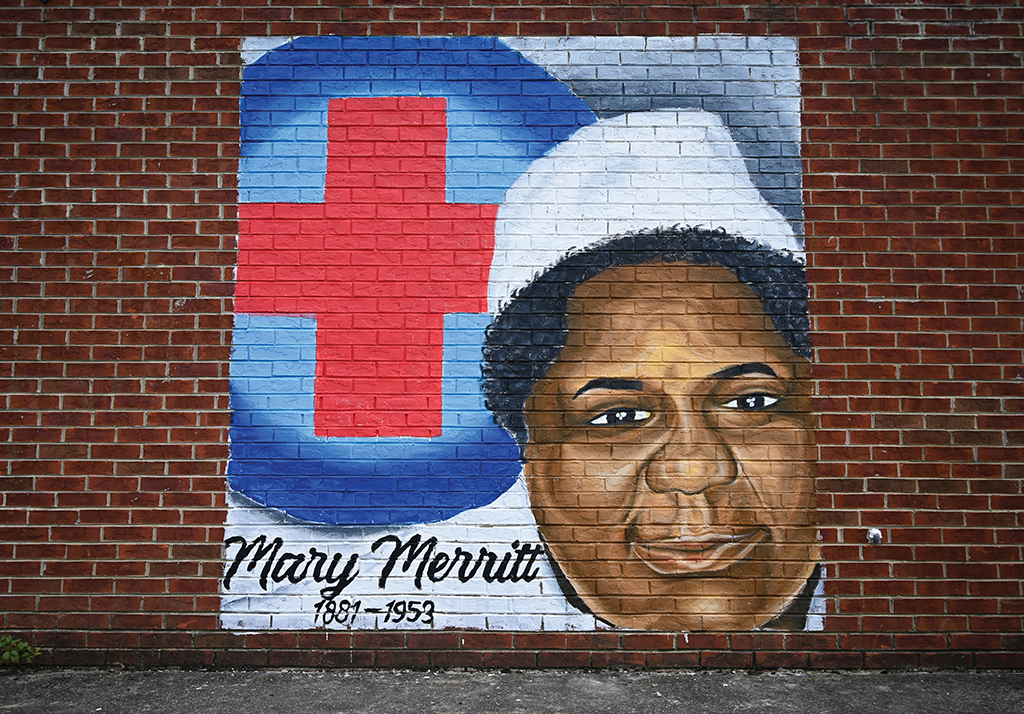 Photo of Mary Merritt mural painted on the side of a brick building in Old Town, Berea