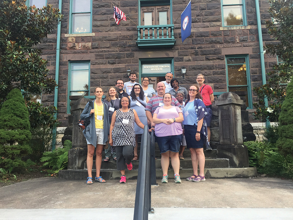 A group from the 2018 Appalachian Tour stands on the steps of the Southwest Virginia Museum