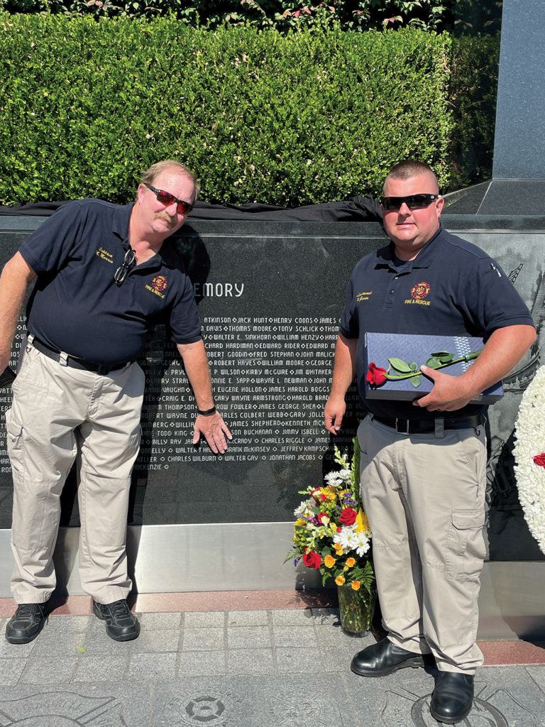 Photo of two Berea firefighters at the new memorial
