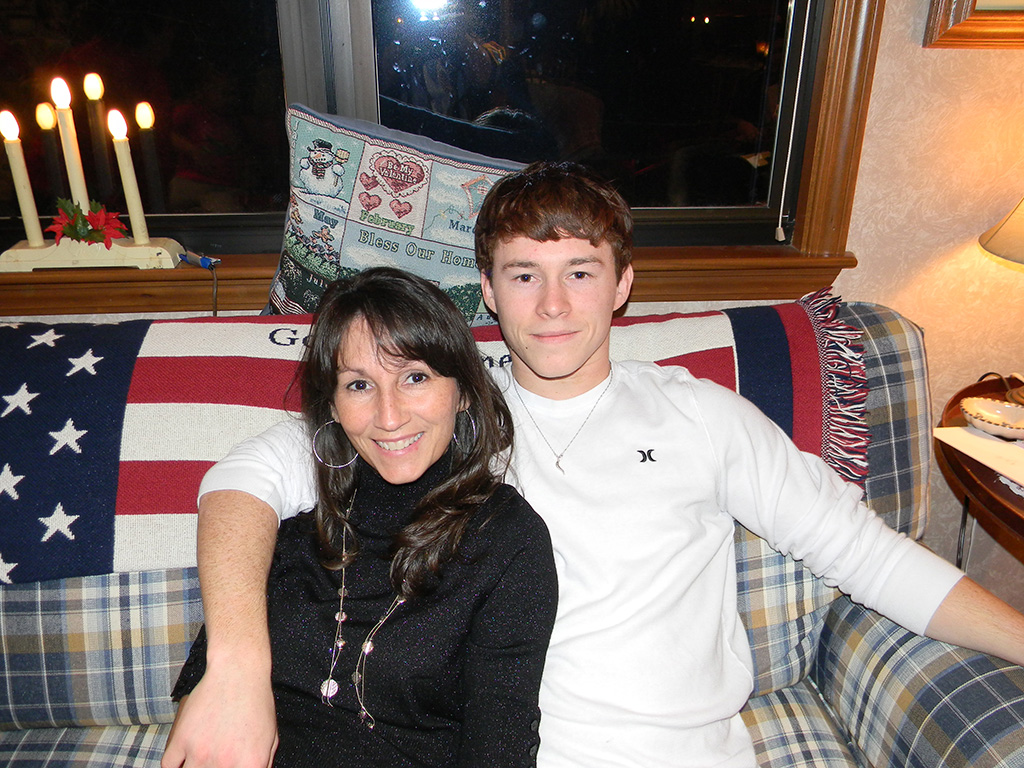 Photo of Kyle and Denise Kincaid sitting on a couch