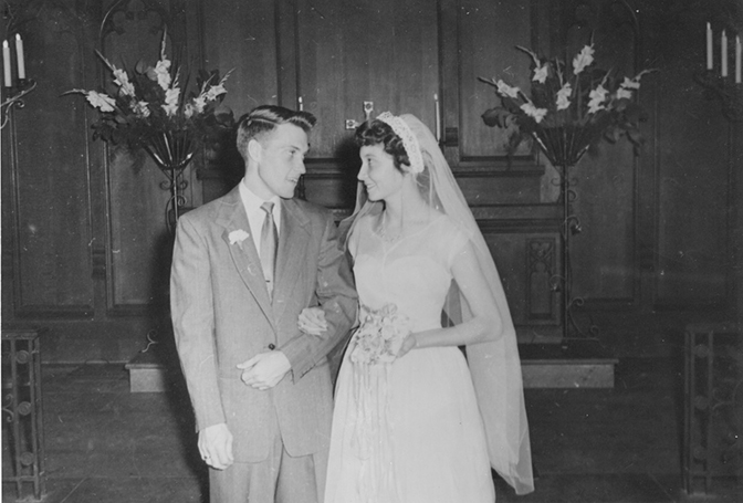 Black and white photo of Bill and Ros Ramsay standing in Danforth Chapel in the early 1950s