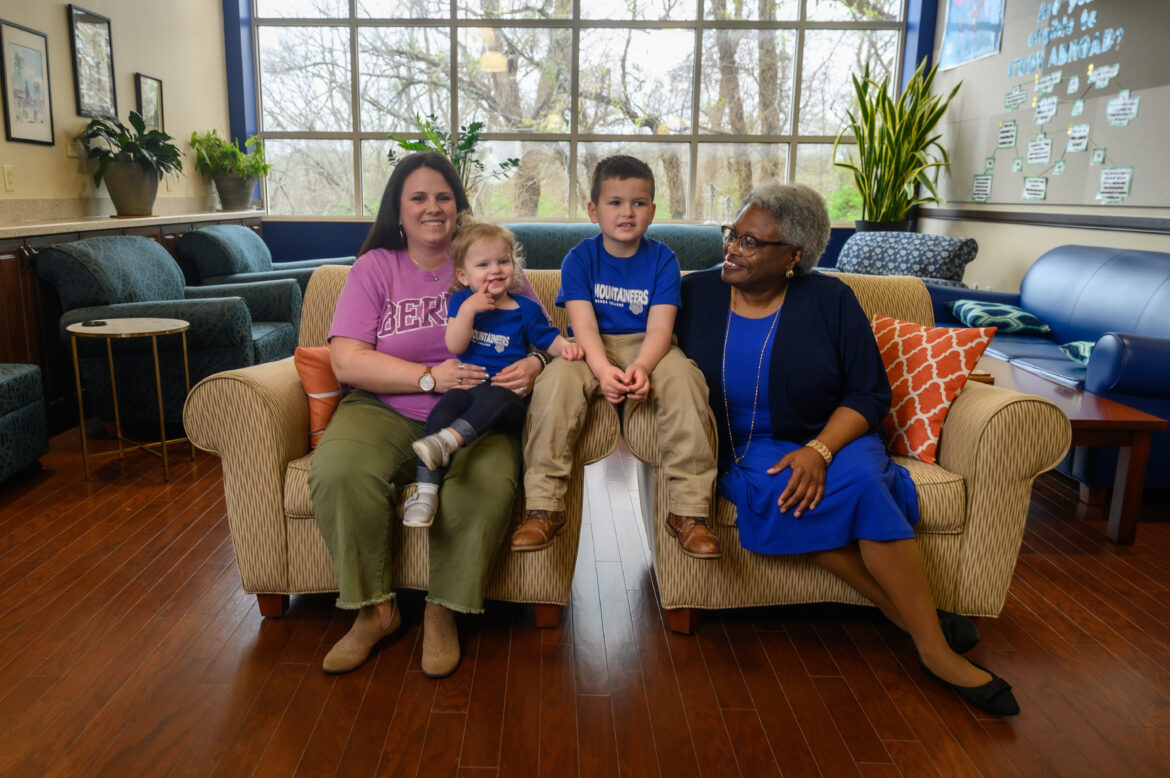 Dr. Althea Webb and Kelci Roddy Reed sit in Knapp Hall with Kelci's two children