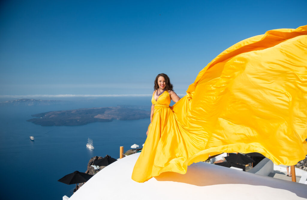 Princess Nash overlooks the ocean in Greece