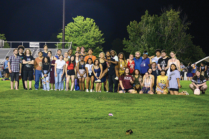 Large group of Bridge students pose for a group photo during an outing.