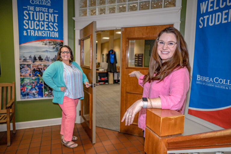 Rosanna Hutcheson '13 and Shalamar Sandifer '03 stand outside the Office of Student Success and Transition