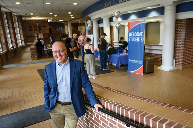 Chris Lakes '98 stands in Seabury during registration for Summer Connections