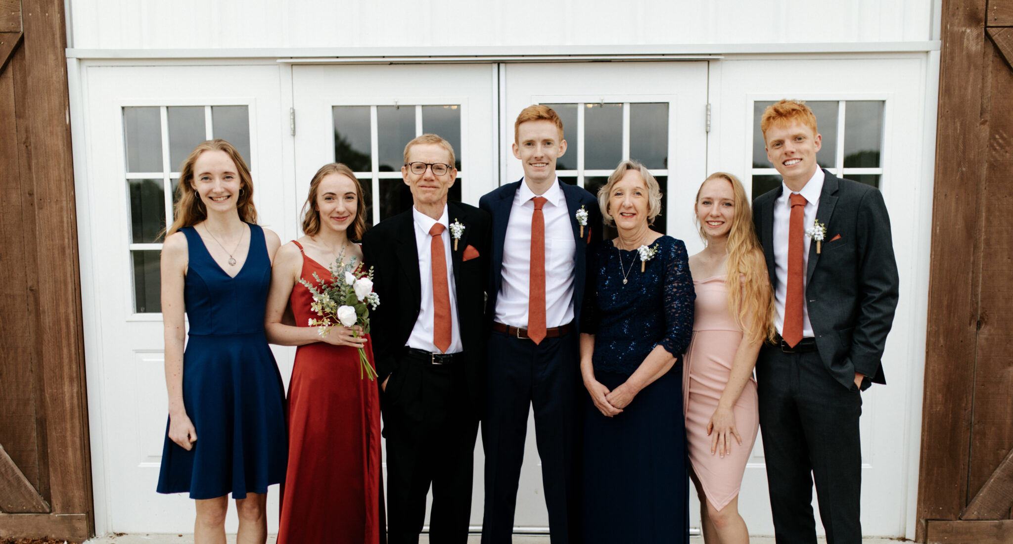 The Reasoner family poses at Seth’s wedding. From left to right: Kaitlyn, Clara, Mark (their dad), Seth, Wendy, Emma and Noah.
