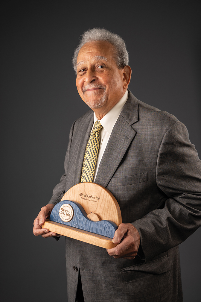 Portrait of Alfred Cobbs with his Distinguished Alumnus award