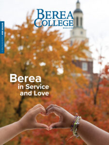 Cover of Winter 2024 Issue of the Berea College Magazine. Two hands making a heart in front of fall trees and Draper Tower in the background.