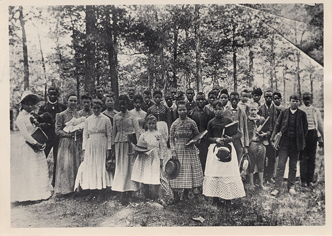 Black and White image of interracial Berea College students in the late 1800s