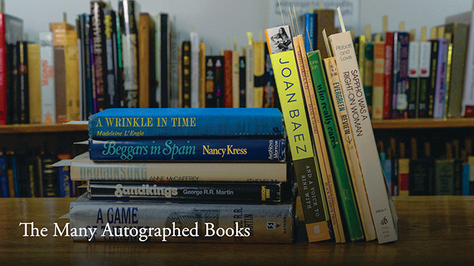 Stack of autographed books Janis Ian has collected from authors she knows well