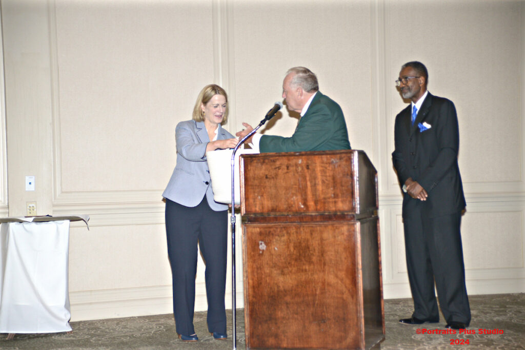 President Cheryl Nixon receives gift