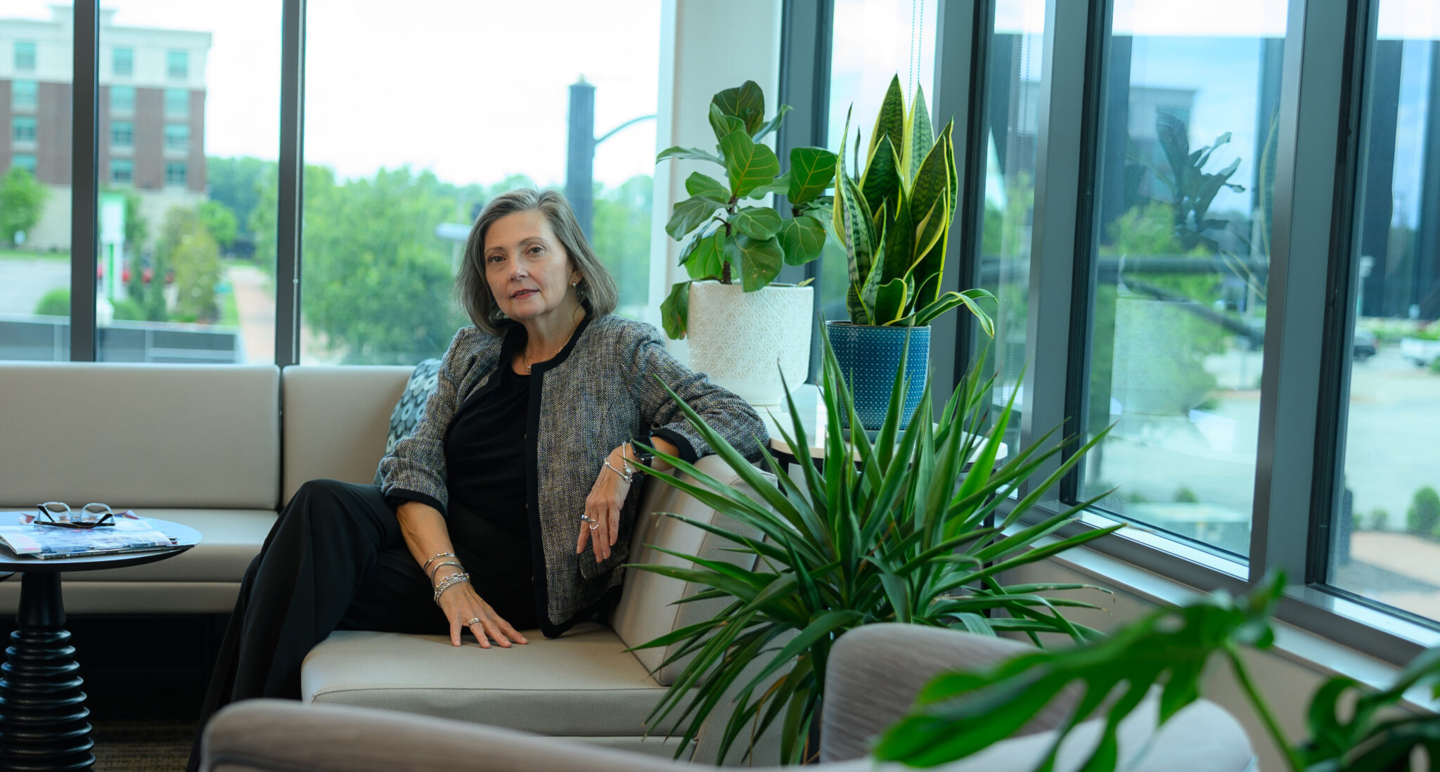 Portrait of Talina Mathews in her corner office
