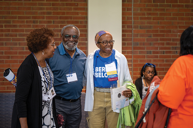Merry Stewart ʼ75, husband, Wills Stewart and Berea Sociology Professor Jackie Burnside ʼ74 share a hug and a photo after the Alumni Awards ceremony.