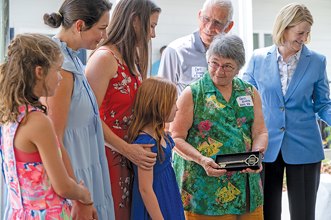 316 Estill Street: The Best House in Town Photo of Ann Evans showing a key to her daughters and granddaughters to the Best-Evans House in Berea during the dedication ceremony