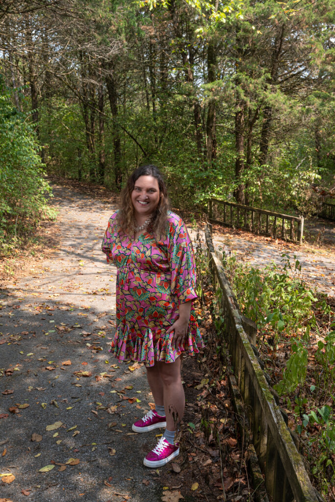Portrait of Melissa Benson '11 on a nature trail