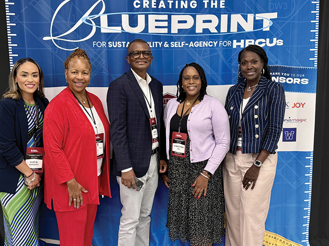 Portrait of Christina Caul and others in front of a Creating the Blueprint backdrop.