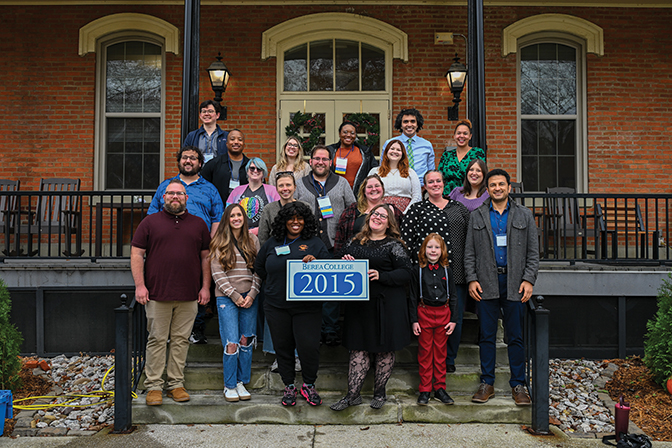 Members of the class of 2015 stand outside of Fairchild hall.