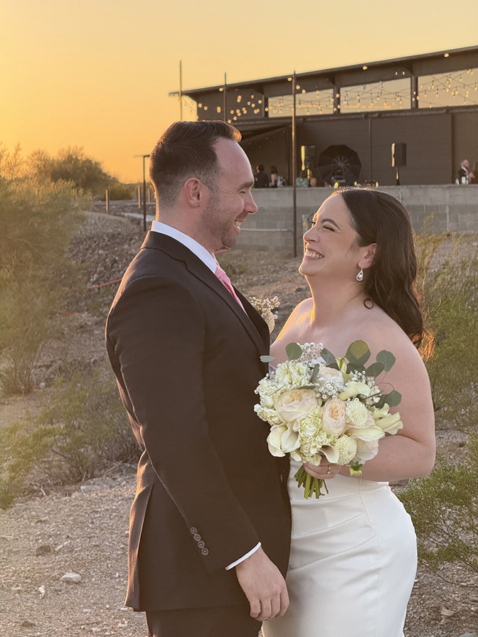 Portrait of Lara Zavalza-Neeson and husband Jacob at their wedding
