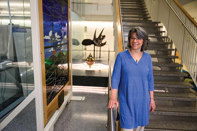 Biology Professor Dr. Megan Hoffman poses in the MAC Building on Berea College's Campus. 