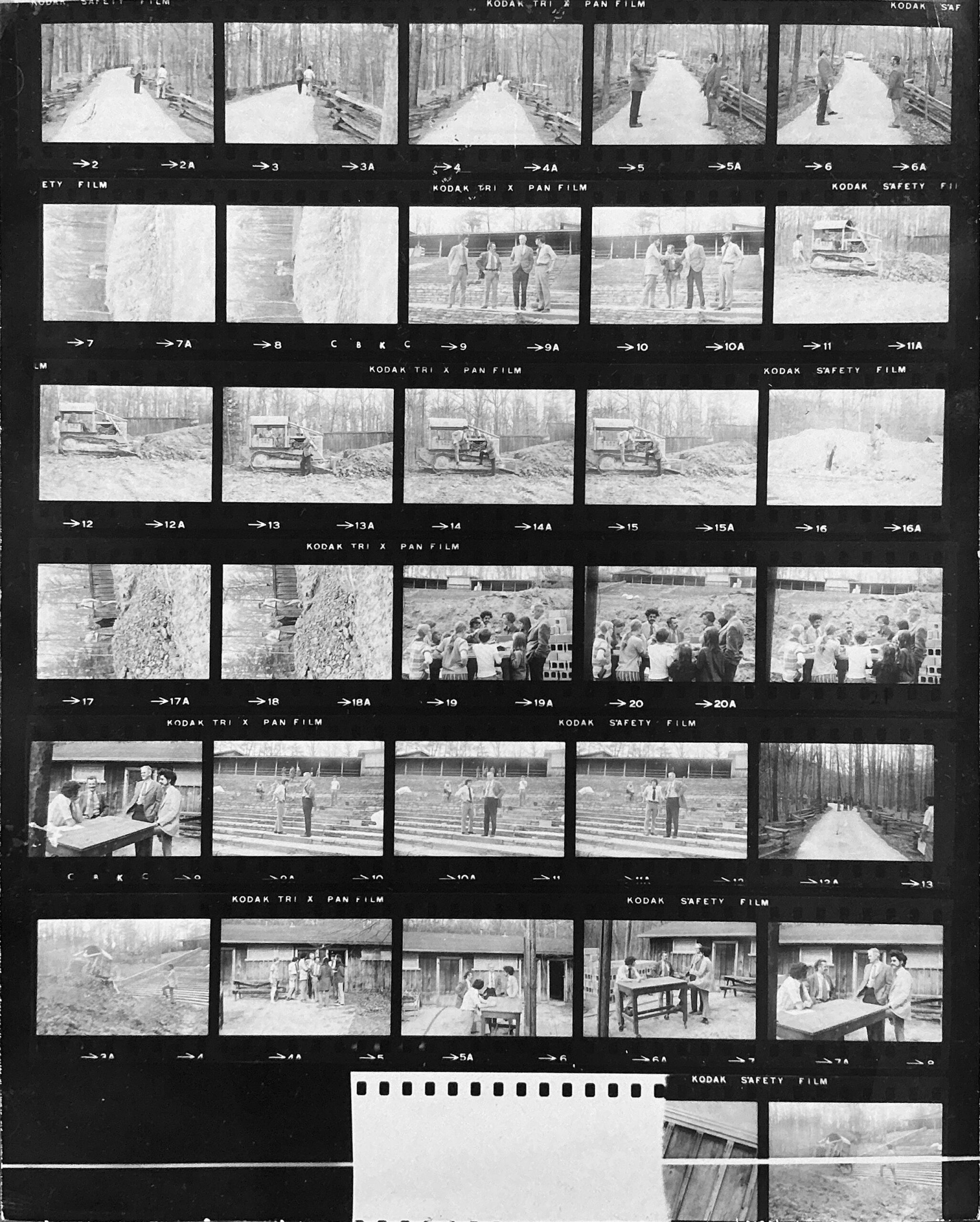 Black and white photos in a film strip of the construction of Indian Fort Theatre.