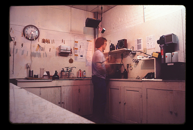 O'Neil Arnold processes film in the dark room of the old Edwards Building on the Berea College campus. 